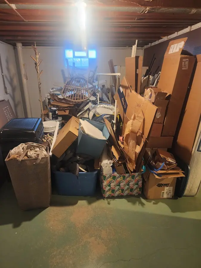 Roll-off dumpster container at job site for 15 Yard Dumpster Rental in Newport